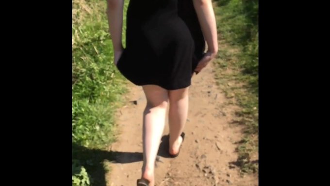 Slow Walk Along The Riverside Path
