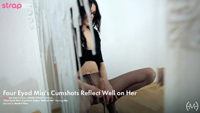 See How This Kinky Beauty Wears Heels While She Pleases Herself With Her Strapless Cock.