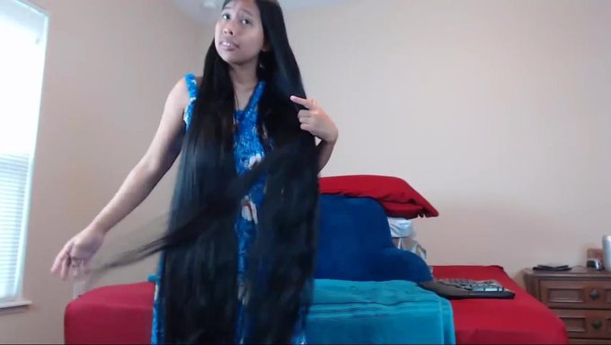 Amateur Asian Babe Strips And Plays With Her Hair On Webcam