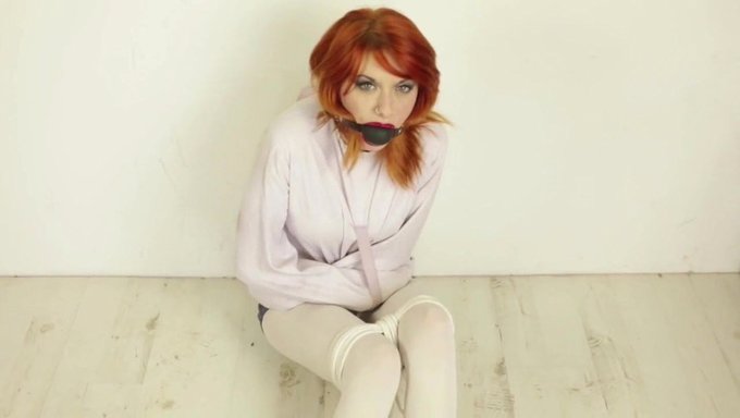 Young Amber Locked In Straight Jacket For Bondage Play