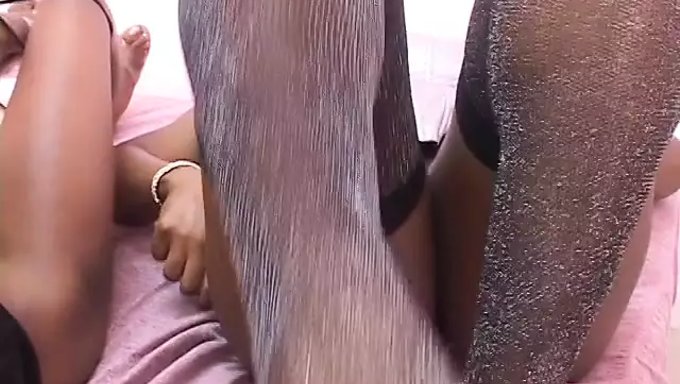 Two Ebony Women Pleasure Each Other With Lingeries And Strap-Ons In Bed